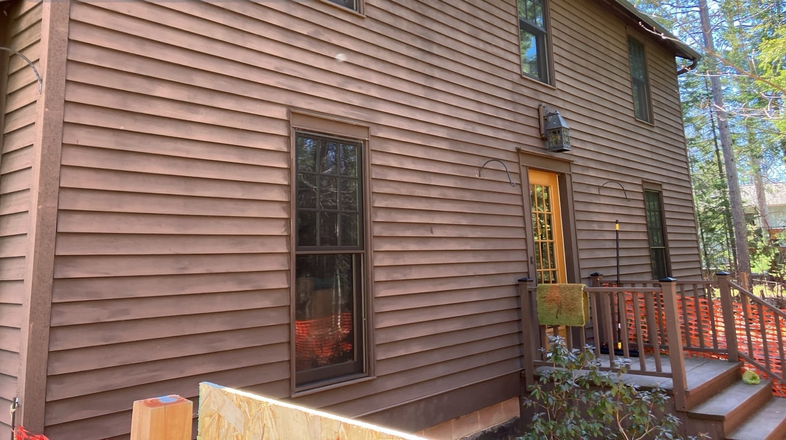Old siding and trim around the side entry before the work